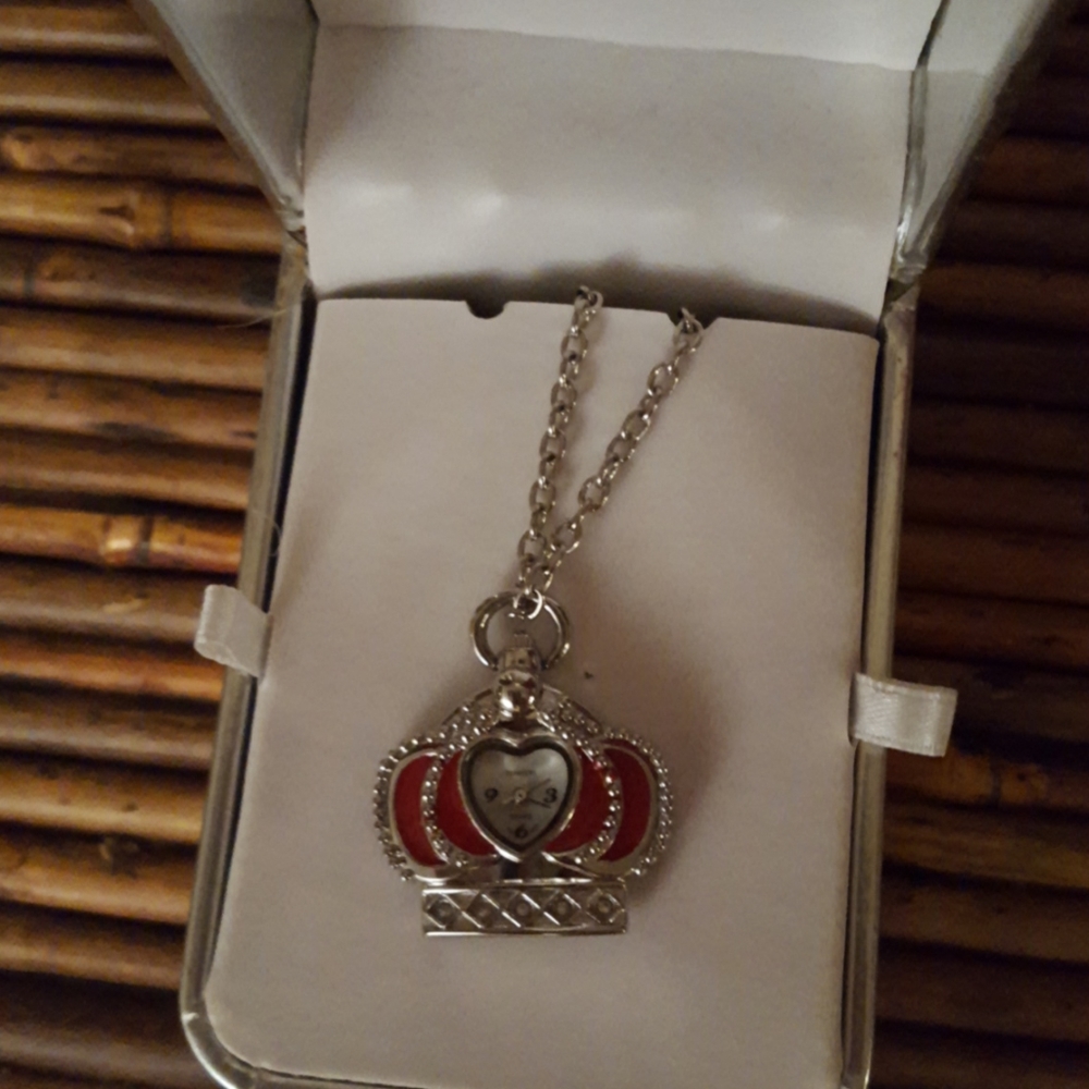 Red crown necklace clock